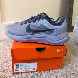 New in box, men’s Nike Downshifter size 8 OR can be a women’s 9.5.